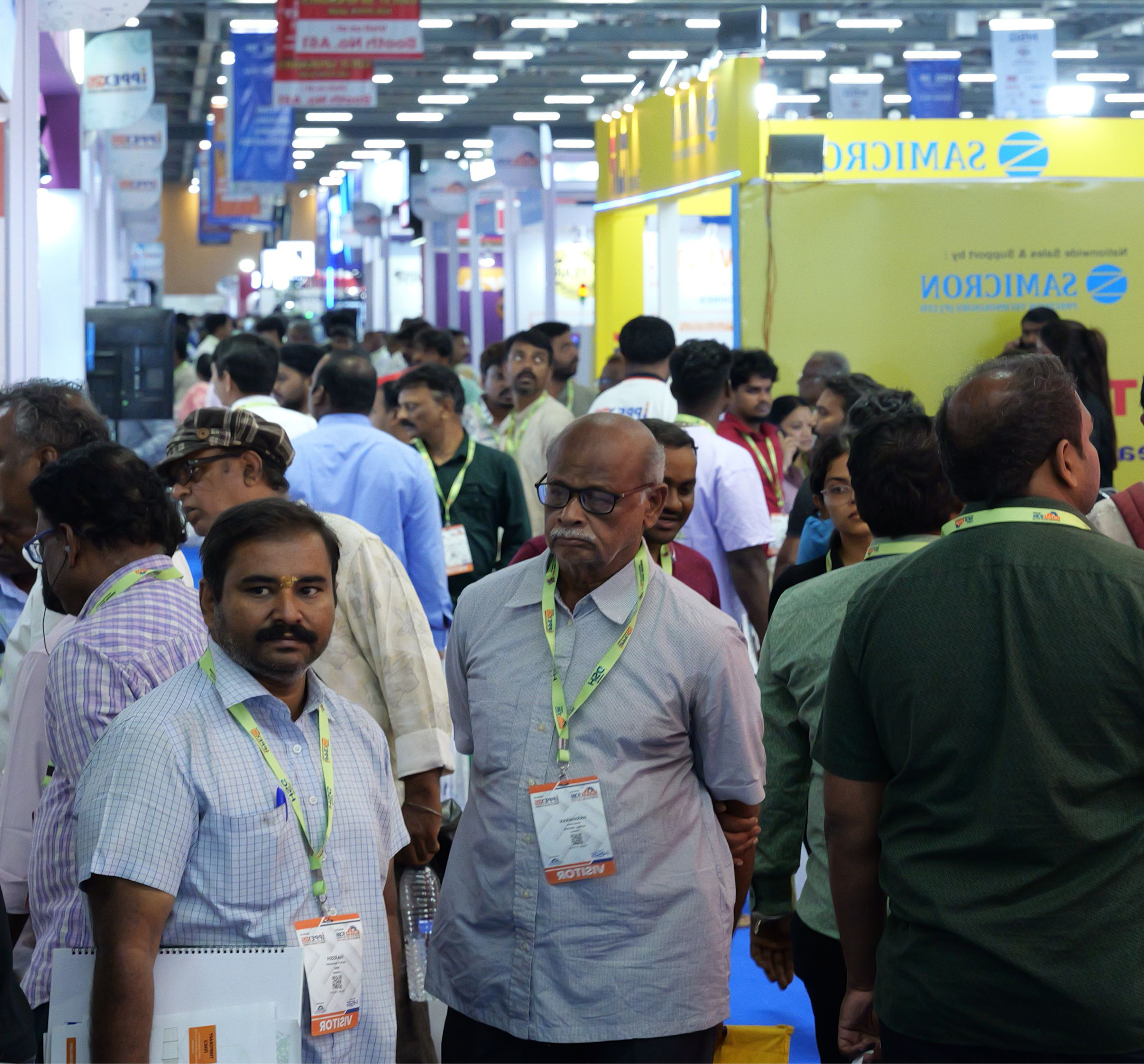 Business visitors exploring the IMTOF 2026 exhibition halls